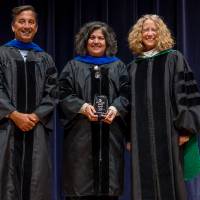 Robert Smart, and Faculty holding award with Provost